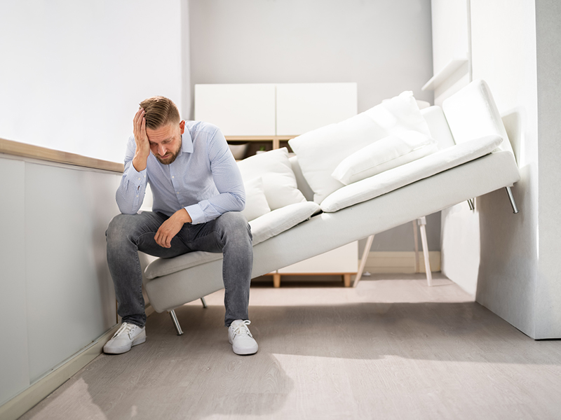 Interior Design Services | Is Your Home Sabotaging Your Life? Frustrated Man